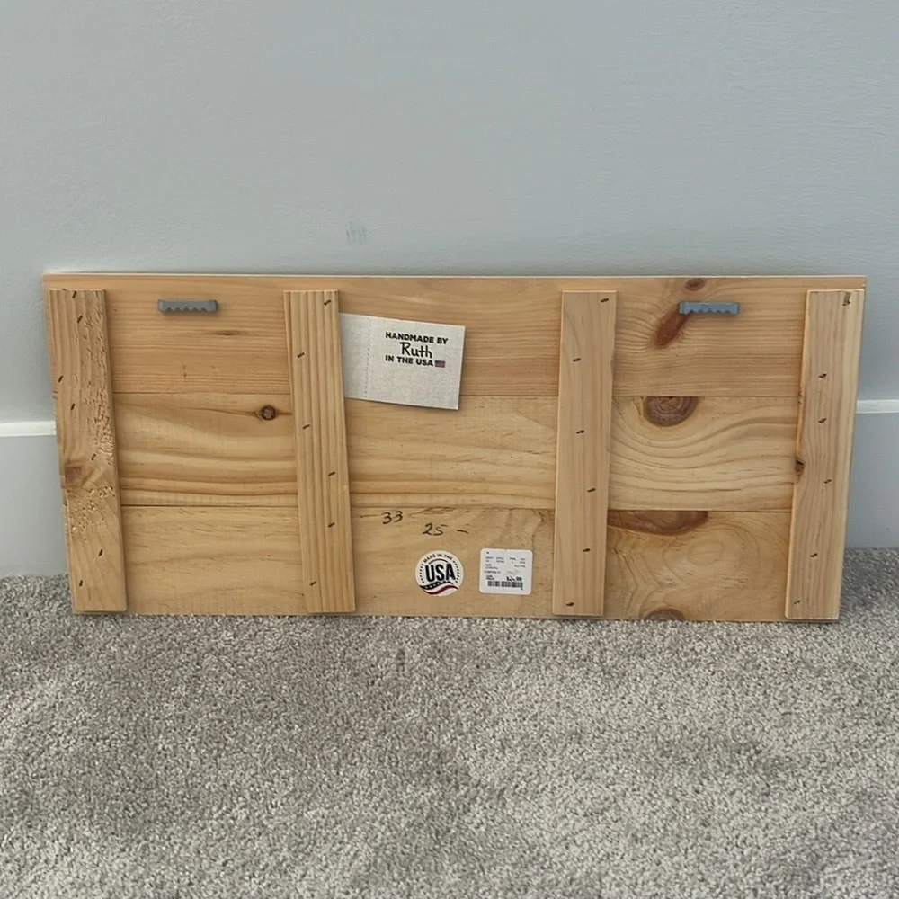 Wooden towels and trunks sign